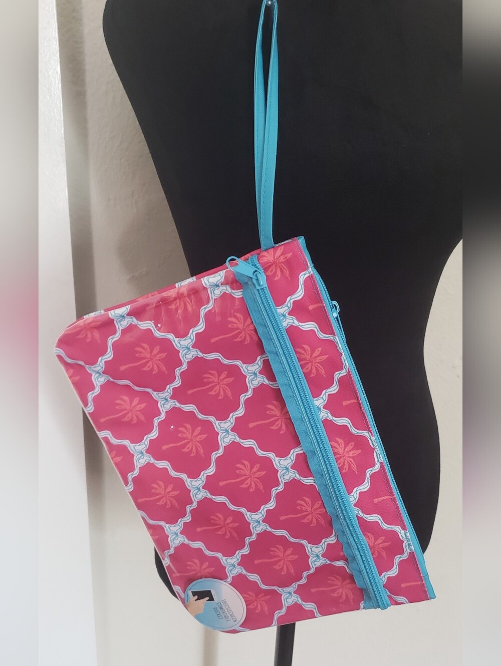 Women's Pink Patterned Wristlet with Turquoise Trim & Touchcreen Compatible Pock